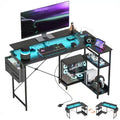 HOMCOM 58 Reversible L Shaped Desk with Storage Bag, Corner Computer Desk with Power Outlet and LED Light, Monitor Shelf and CPU Stand